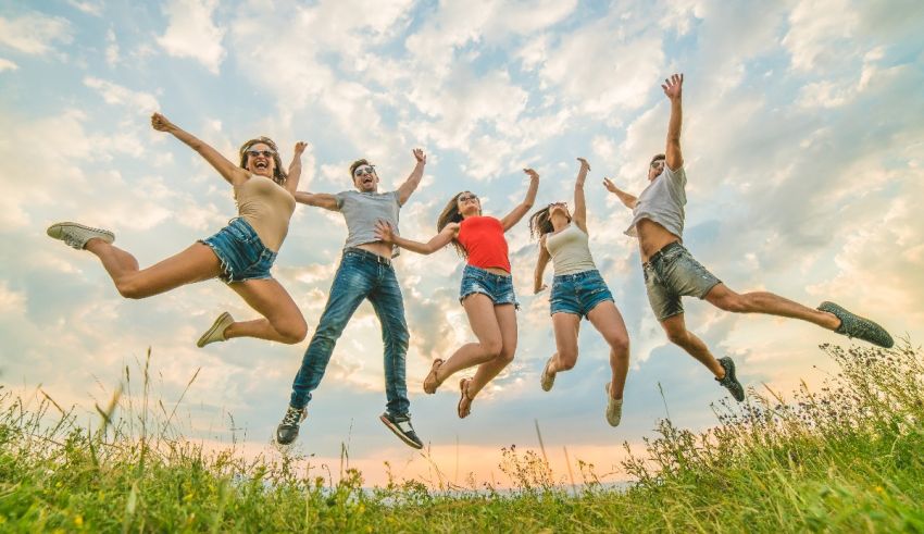 A group of friends jumping in the air.