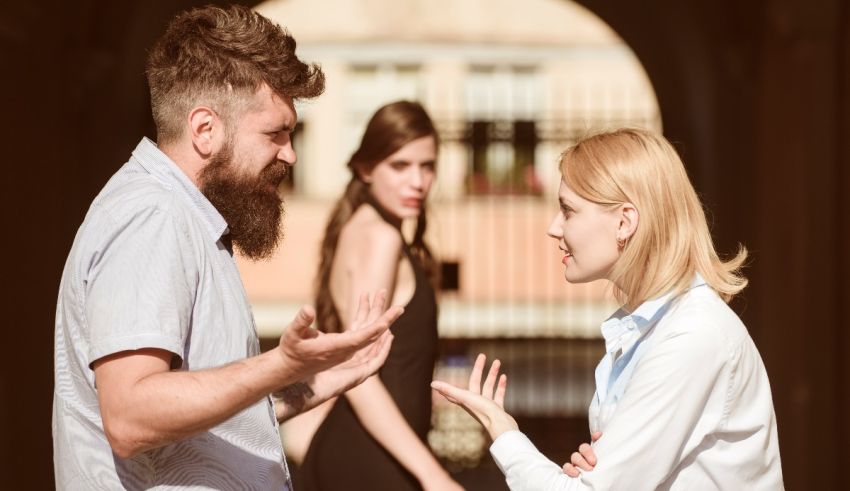 A man and woman talking to each other in an alleyway.