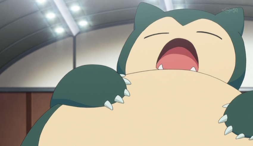 A pokemon with its mouth open in a gym.