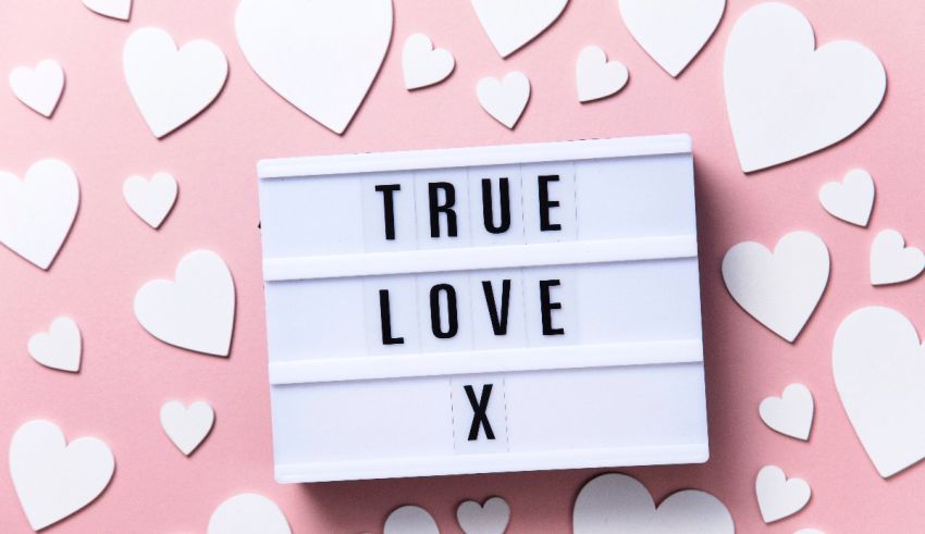 True love x on a pink background with white hearts.
