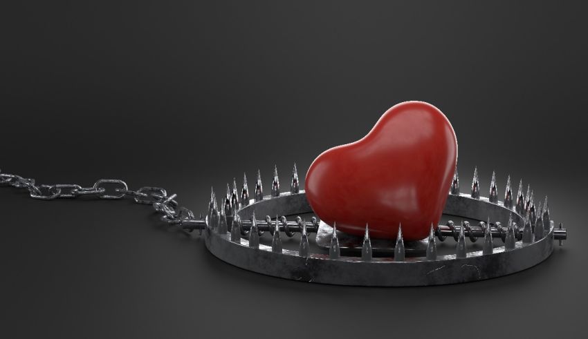 A red heart with spikes on a black background.