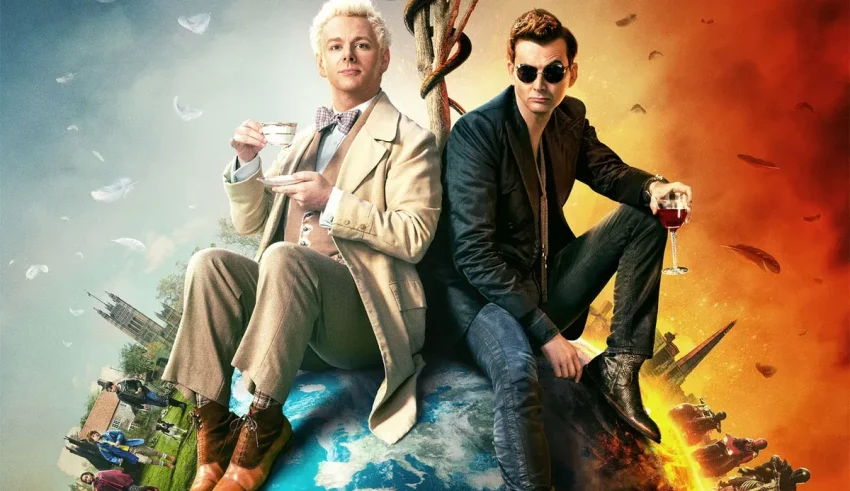 Two men sitting on top of a globe.