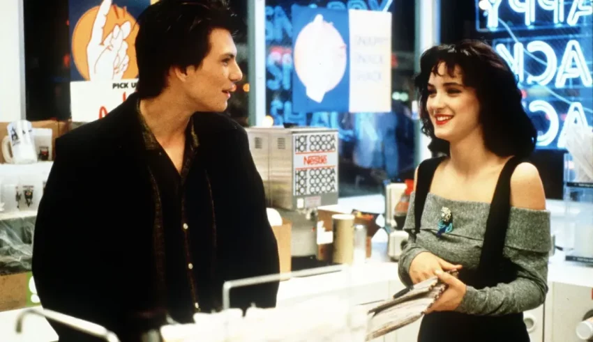 A man and woman standing next to each other in a store.