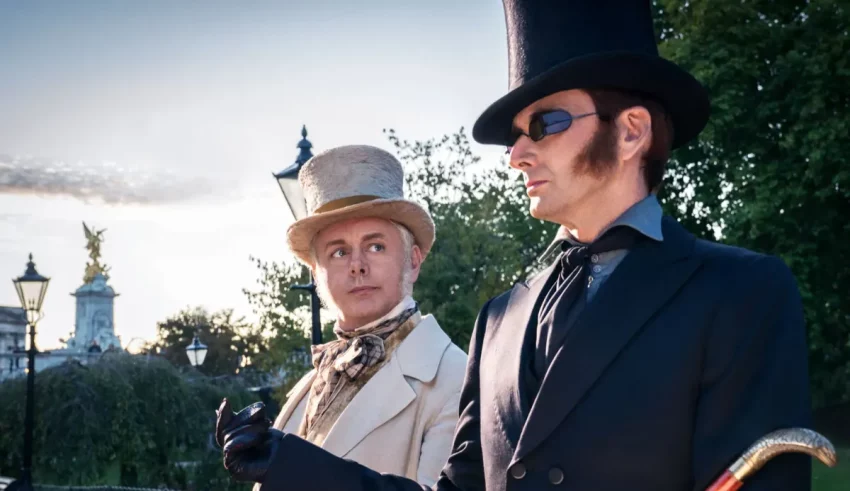 Two men in top hats standing next to each other.