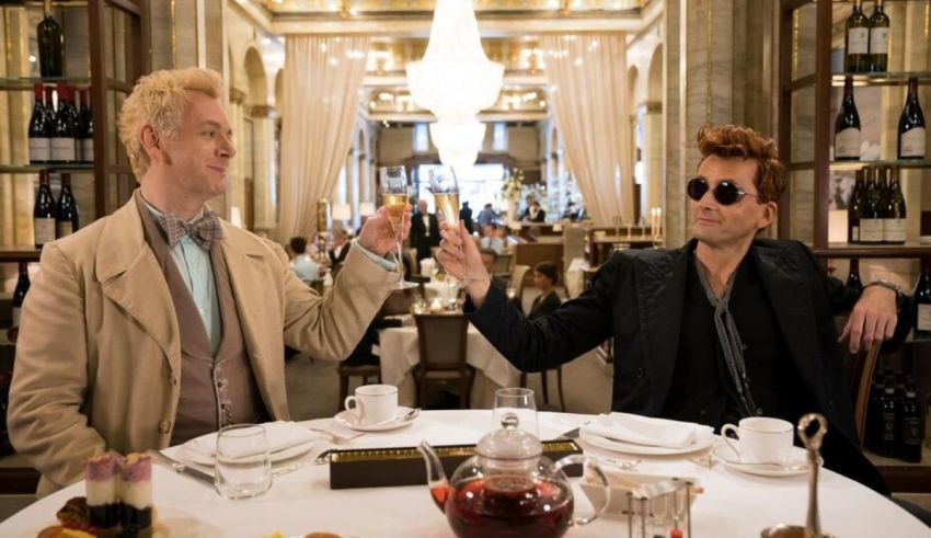 Two men sitting at a table in a restaurant.