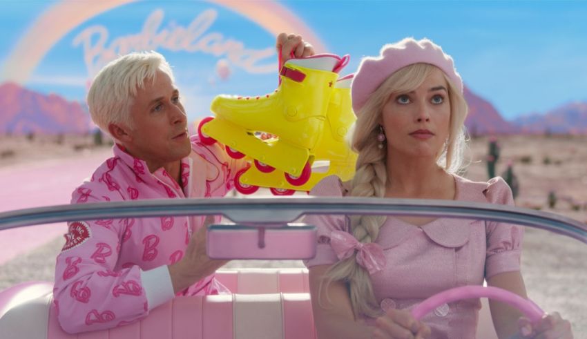 A man and a woman dressed in pink in a car.