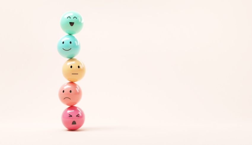 Colorful easter eggs stacked on top of each other on a light background.