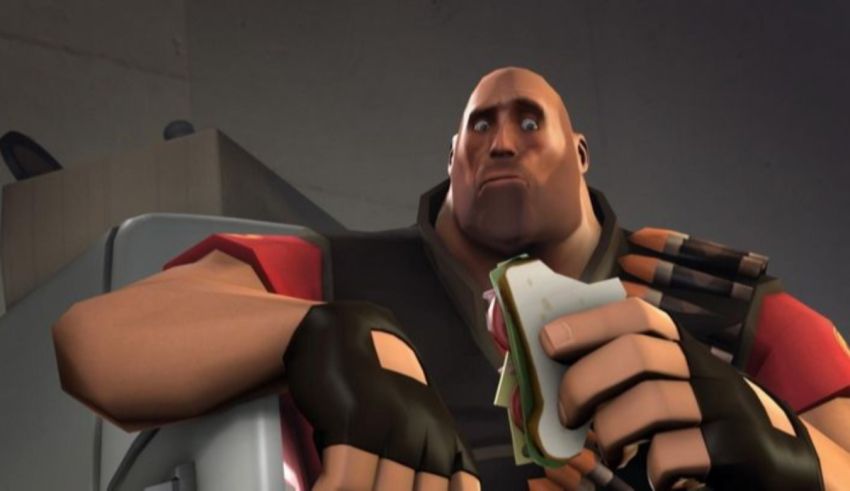 An image of a man holding a sandwich.