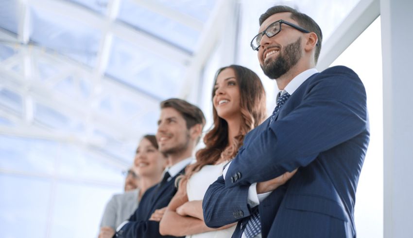 A group of business people standing in a line.