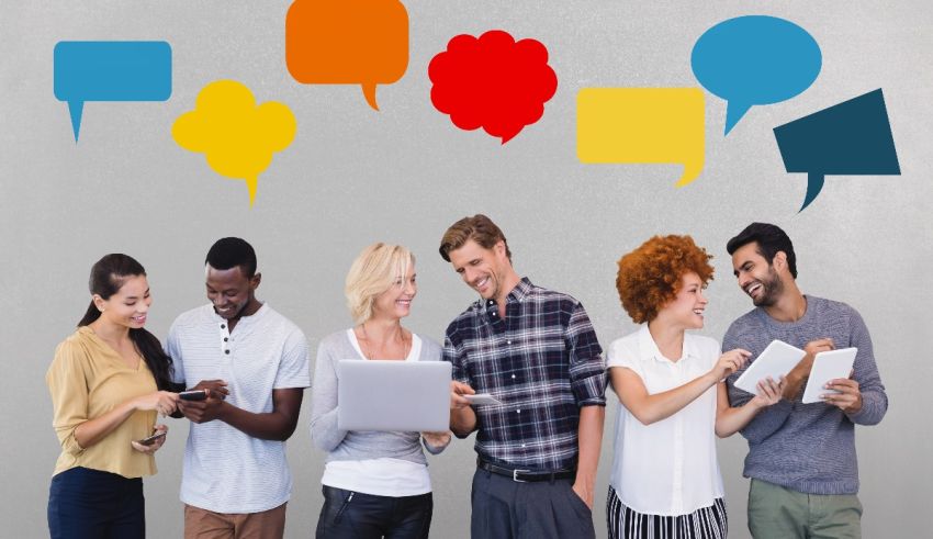 A group of people talking with speech bubbles.