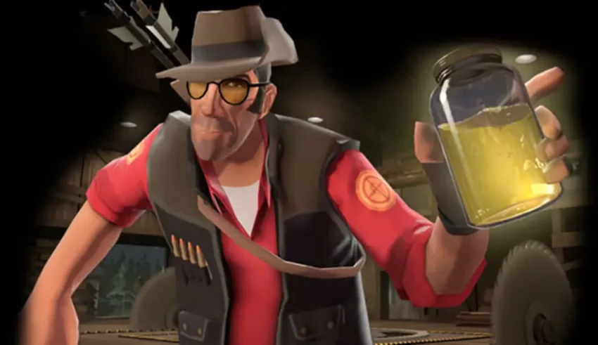 An image of a man holding a bottle of beer.