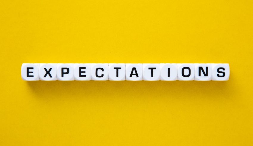 The word expectations spelled out on a yellow background.