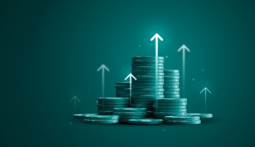 A stack of coins with arrows pointing upwards.