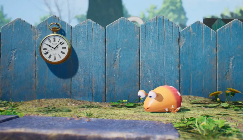 A little mouse is sitting in front of a fence with a clock.