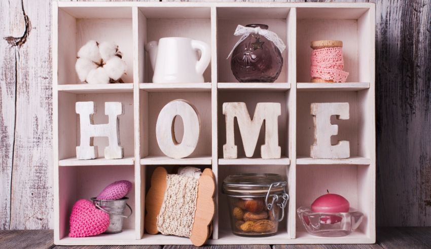 A wooden shelf with the word home on it.