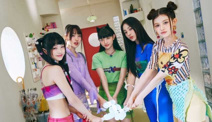 A group of girls in colorful clothes posing for a picture.