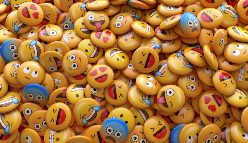 A pile of emoji buttons with different faces.