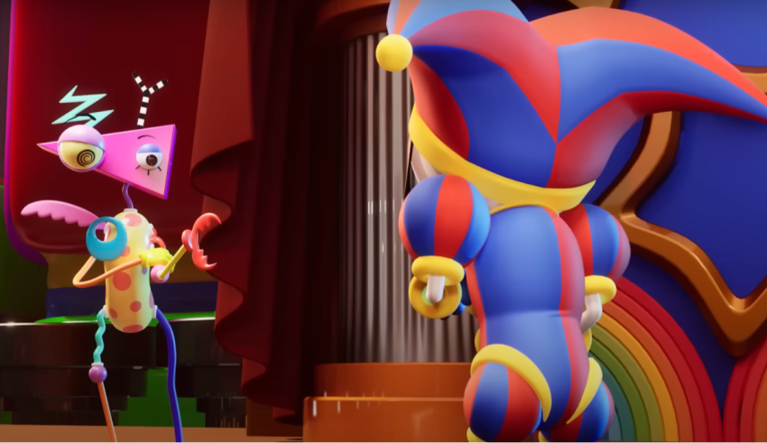A cartoon character dressed as a clown is standing in front of a stage.