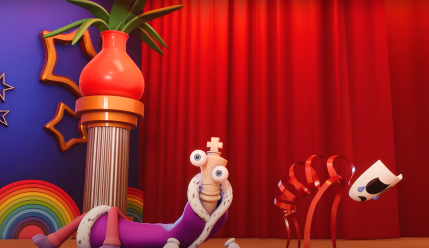 A cartoon character is sitting on a stage in front of a curtain.