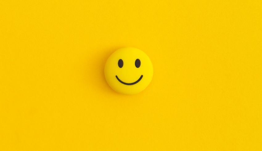 A yellow smiley face on a yellow background.