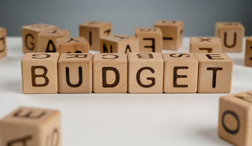 A wooden block with the word budget spelled out.