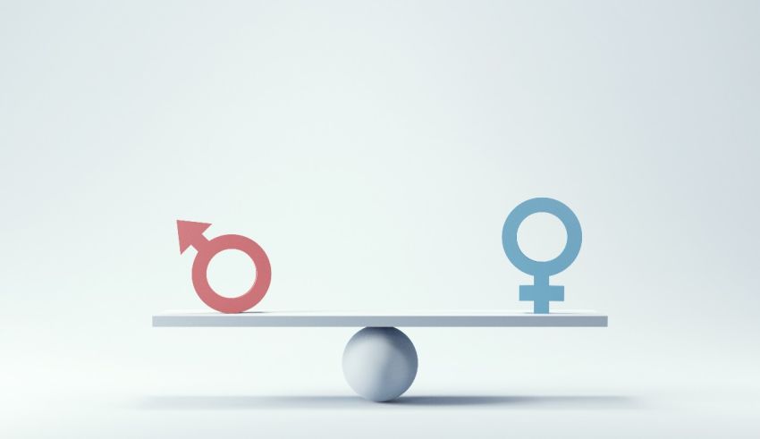 A female and male symbol on a seesaw.