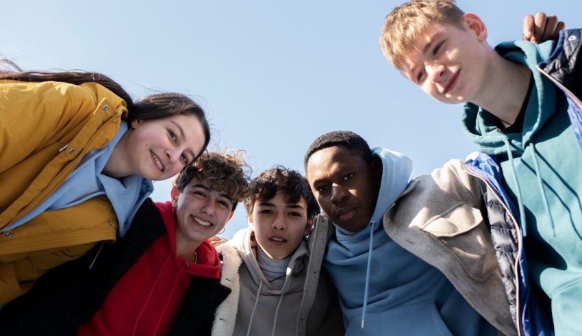 A group of young people posing for a photo.