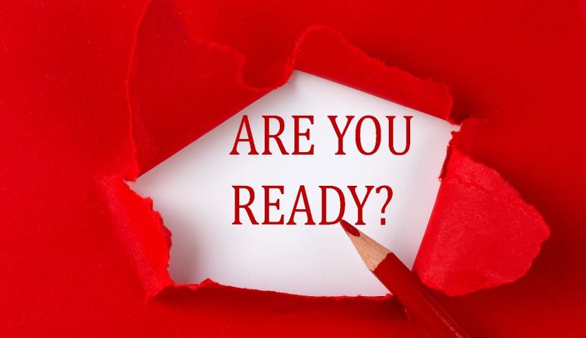A red paper with the words are you ready?.