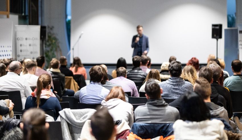 A man is giving a presentation to an audience.
